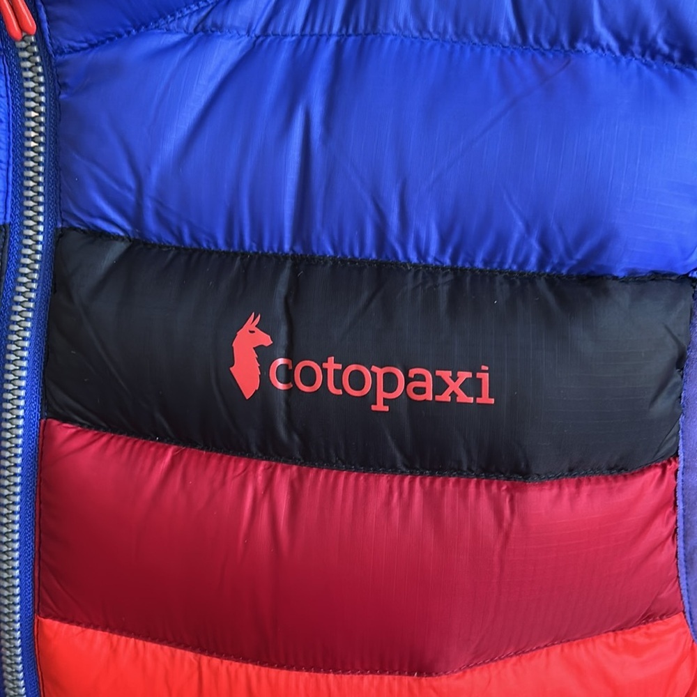 cotopaxi Royal Blue Puffer Vest with Black and Red Stripe - Picture 2 of 9